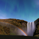 Illustration for article titled Feast your eyes on a rare lunar rainbow — against the Northern Lights!